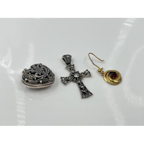 1101 - Three pieces of jewellery, .925 silver CZ stone cross pendant, white metal marcasite heart shaped ph... 