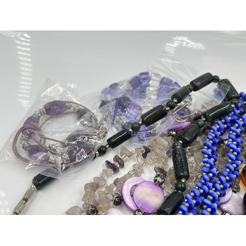 1107 - A collection of costume jewellery to include quartz and amethyst necklace, lapis lazuli bracelet etc... 