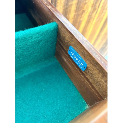 1 - A 1950s Gimson & Slater Ltd Vesper Furniture walnut sideboard with three central drawers and two out... 