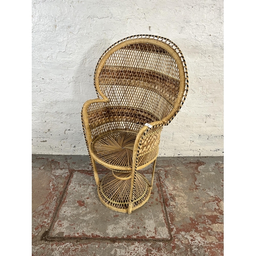 100 - A mid 20th century wicker peacock chair - approx. 108cm high x 68cm wide