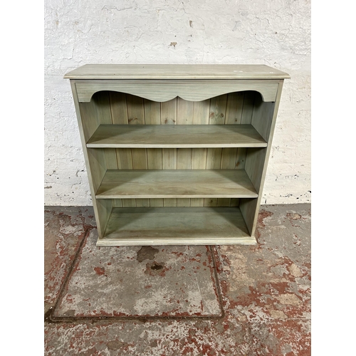 102 - A modern painted pine three tier open bookcase - approx. 93cm high x 91cm wide x 33cm deep