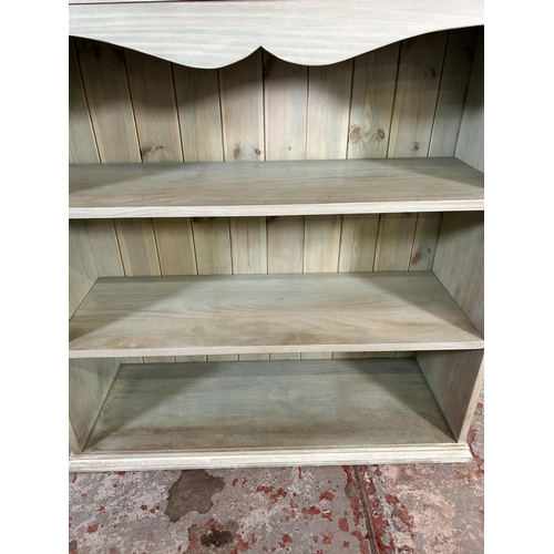 102 - A modern painted pine three tier open bookcase - approx. 93cm high x 91cm wide x 33cm deep