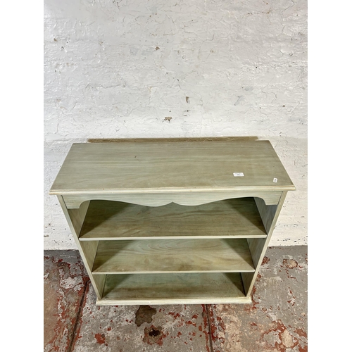 102 - A modern painted pine three tier open bookcase - approx. 93cm high x 91cm wide x 33cm deep