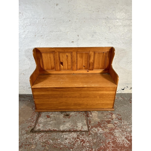 103 - A modern pine monks bench - approx. 92cm high x 123cm wide x 46cm deep