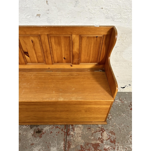 103 - A modern pine monks bench - approx. 92cm high x 123cm wide x 46cm deep