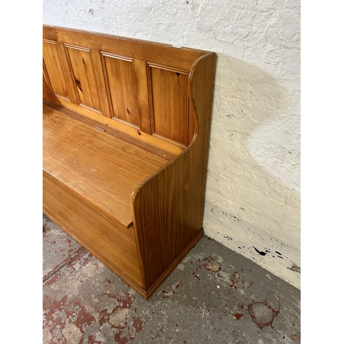 103 - A modern pine monks bench - approx. 92cm high x 123cm wide x 46cm deep