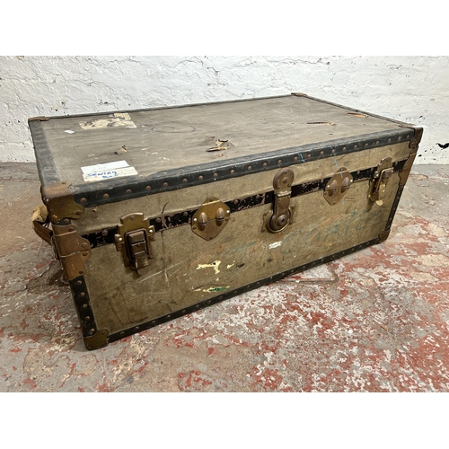 107 - An early 20th century Overpond travel trunk - approx. 36cm high x 91cm wide x 51cm deep