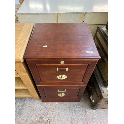 108 - An oak effect two drawer office filing cabinet with keys - approx. 77cm high x 45cm wide x 40cm deep