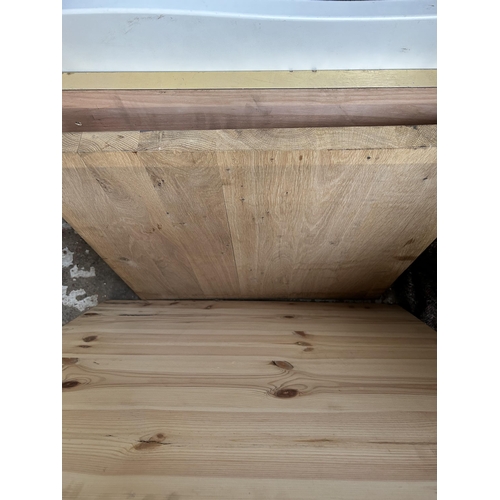 11 - Fourteen various sized wooden table tops to include oak, pine etc. - largest approx. 90cm x 90cm