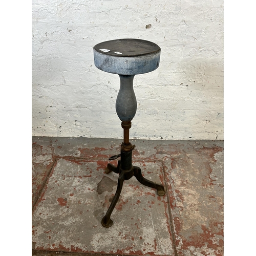 123 - A late 19th/early 20th century cast iron potter's wheel - approx. 81cm high x 22cm diameter