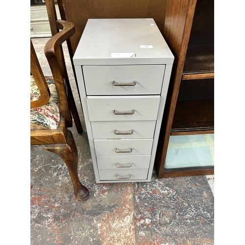 130 - A grey metal six drawer office filing cabinet - approx, 69cm high x 28cm wide x 41cm deep