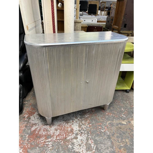 136 - A Hudson Living Jeeves silver painted drinks cabinet - approx. 97cm high x 98cm wide x 40cm deep