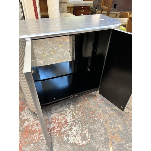 136 - A Hudson Living Jeeves silver painted drinks cabinet - approx. 97cm high x 98cm wide x 40cm deep