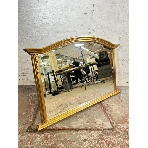 137 - A 19th century style gilt framed bevelled edge overmantel mirror - approx. 78cm high x 123cm wide