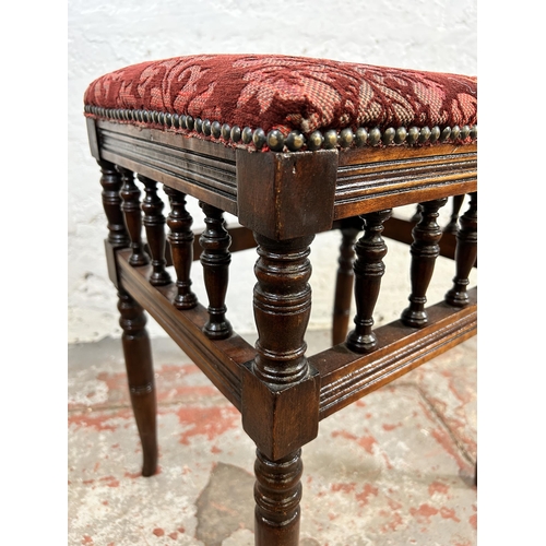 139 - An Edwardian mahogany and red floral upholstered piano stool - approx. 52cm high x 40cm wide x 33cm ... 