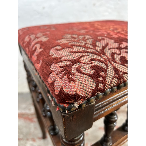 139 - An Edwardian mahogany and red floral upholstered piano stool - approx. 52cm high x 40cm wide x 33cm ... 