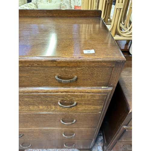 142 - An Art Deco style oak chest of five drawers retailed by Arighi Bianchi & Co Limited Macclesfield - a... 