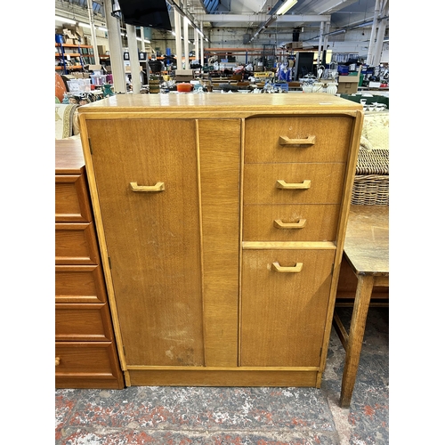 145 - A 1950s G Plan Brandon oak gentleman's wardrobe - approx. 122cm high x 88cm wide x 46cm deep