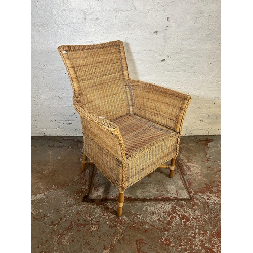 159 - A modern wicker armchair - approx. 97cm high x 67cm wide x 49cm deep