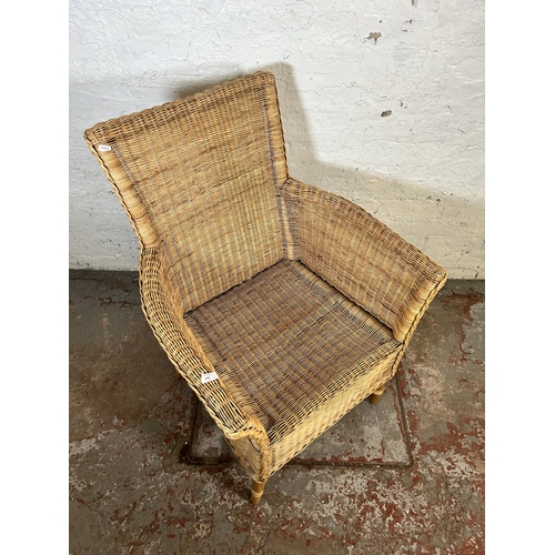 159 - A modern wicker armchair - approx. 97cm high x 67cm wide x 49cm deep