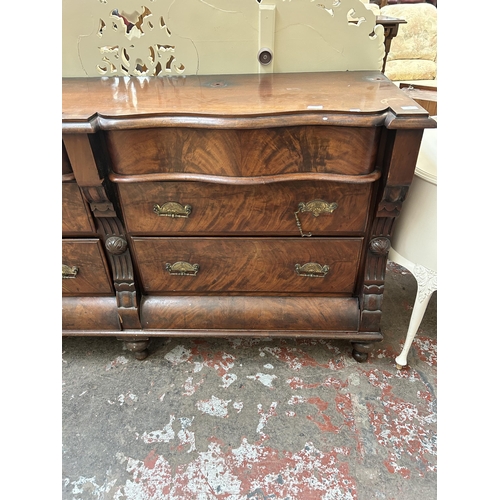 21 - A Victorian flame mahogany serpentine sideboard with six drawers and baluster supports - approx. 96c... 