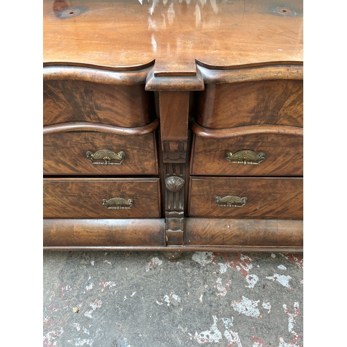 21 - A Victorian flame mahogany serpentine sideboard with six drawers and baluster supports - approx. 96c... 