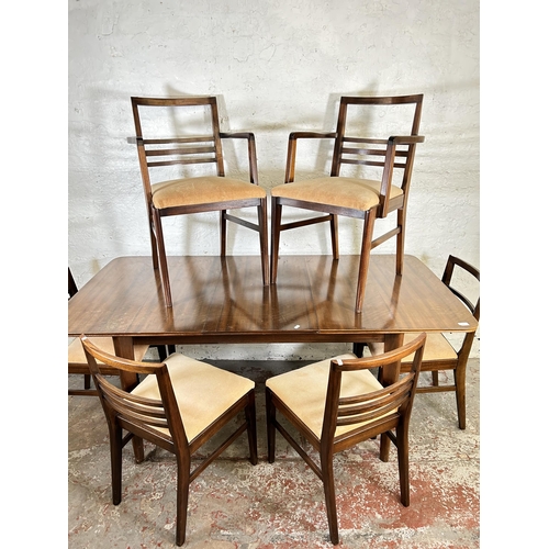 3 - A mid 20th century walnut extending dining table and six matching chairs - approx. 75cm high x 86cm ... 