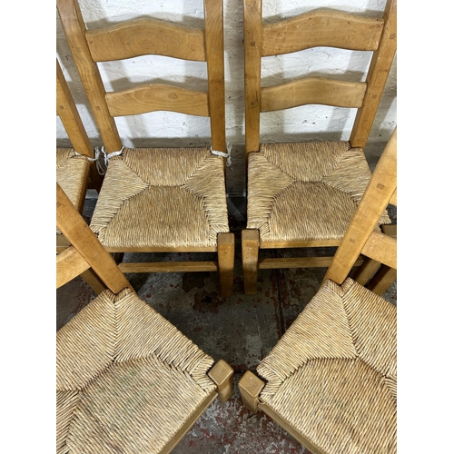 31 - A set of six beech and rush seated ladder back dining chairs - approx. 100cm high x 48cm wide x 42cm... 