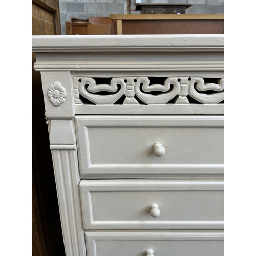 35 - A modern white painted chest of four drawers - approx. 101cm high x 80cm wide x 34cm deep