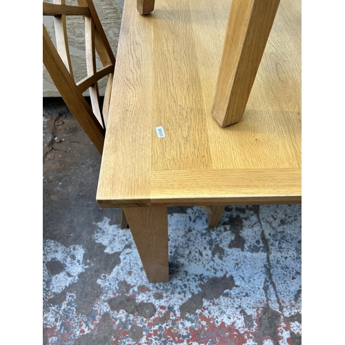 49 - A modern oak rectangular extending dining table and four matching dining chairs - approx. 78cm high ... 