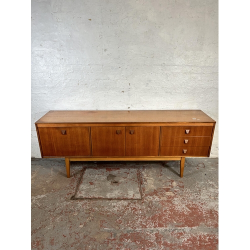 77 - A teak sideboard with three drawers and three cupboard doors - approx. 75cm high x 198cm wide x 45.5... 