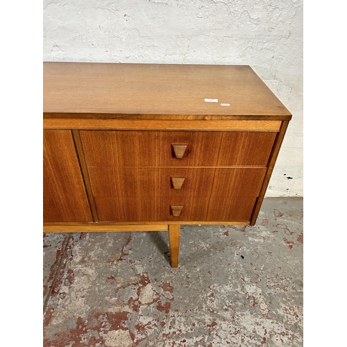 77 - A teak sideboard with three drawers and three cupboard doors - approx. 75cm high x 198cm wide x 45.5... 