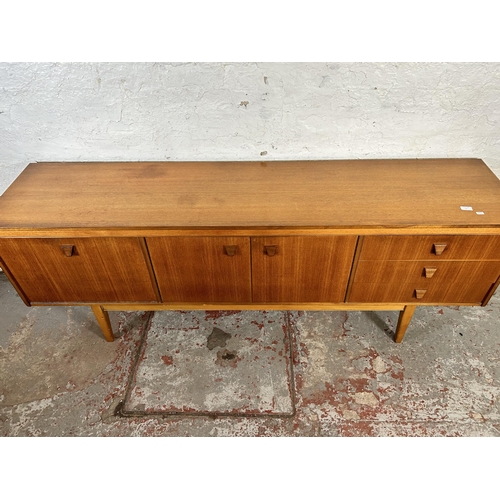 77 - A teak sideboard with three drawers and three cupboard doors - approx. 75cm high x 198cm wide x 45.5... 