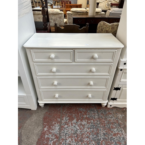 79 - A Victorian style white painted pine chest of two short over three long drawers - approx. 100cm high... 