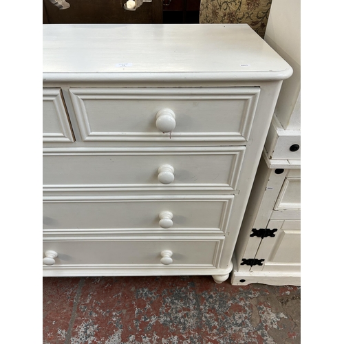 79 - A Victorian style white painted pine chest of two short over three long drawers - approx. 100cm high... 