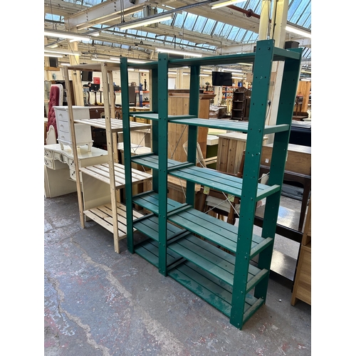 85 - Two wooden shelving units, one green painted - approx. 175cm high x 130cm wide x 34cm deep and one p... 