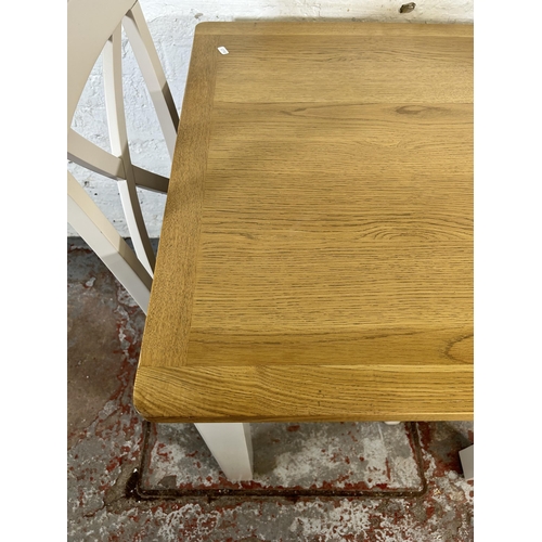 90 - A modern oak and grey painted square dining table and two matching dining chairs - approx. 79cm high... 