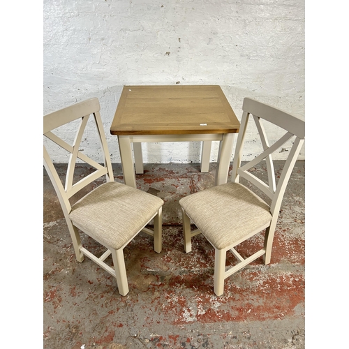 90 - A modern oak and grey painted square dining table and two matching dining chairs - approx. 79cm high... 