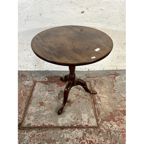 91 - A 19th century mahogany circular tripod occasional table - approx. 70cm high x 62cm diameter