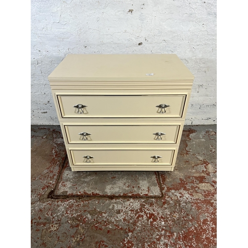 93 - A white laminate chest of three drawers - approx. 76cm high x 75cm wide x 44cm deep