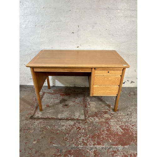 94 - A mid 20th century Burndale oak office desk with three drawers - approx. 73cm high x 120cm wide 67cm... 