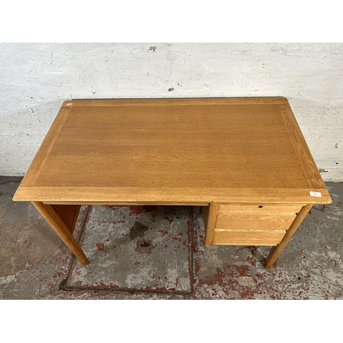 94 - A mid 20th century Burndale oak office desk with three drawers - approx. 73cm high x 120cm wide 67cm... 