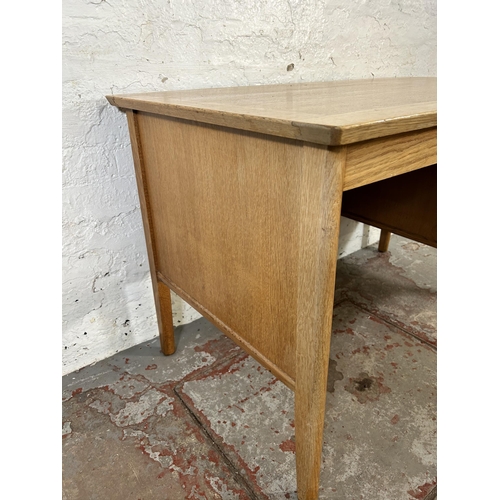 94 - A mid 20th century Burndale oak office desk with three drawers - approx. 73cm high x 120cm wide 67cm... 