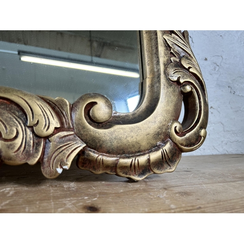 167 - A Rococo style gilt framed wall mirror - approx. 120 cm high x 90cm wide