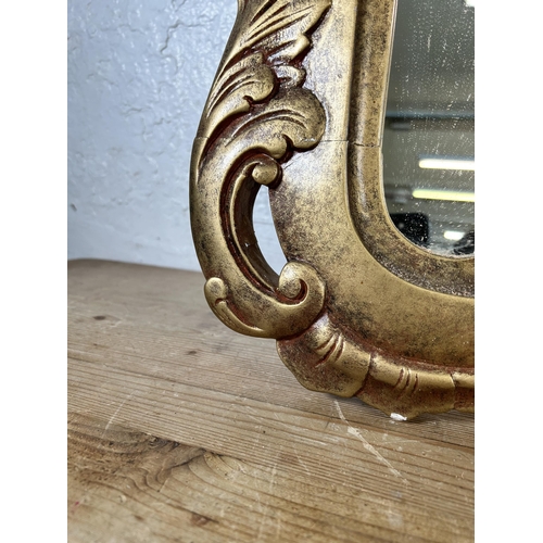 167 - A Rococo style gilt framed wall mirror - approx. 120 cm high x 90cm wide