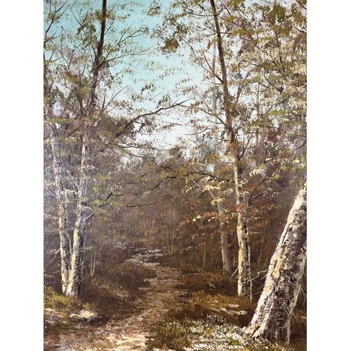 173 - A mid/late 20th century gilt framed oil on canvas of a woodland scene signed lower left 'N. Felter' ... 