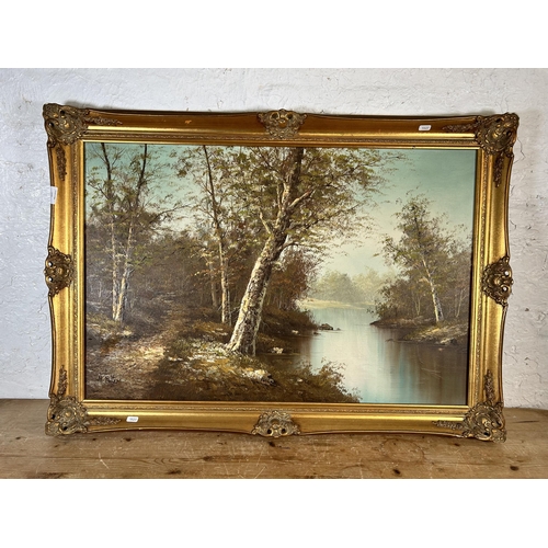 173 - A mid/late 20th century gilt framed oil on canvas of a woodland scene signed lower left 'N. Felter' ... 