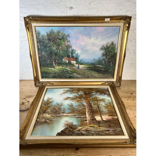 182 - Two mid 20th century gilt framed oil paintings of landscape scenes - largest approx. 64cm high x 90c... 