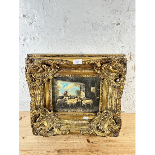 184 - A gilt framed textured print of a farming scene - approx. 40cm high x 40cm wide