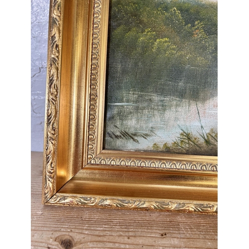 186 - An early 20th century gilt framed oil on canvas of a fishing scene signed lower left - approx. 42cm ... 